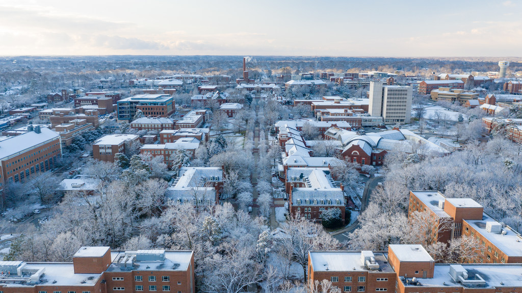 Snow on campus on a bright clear morning.
